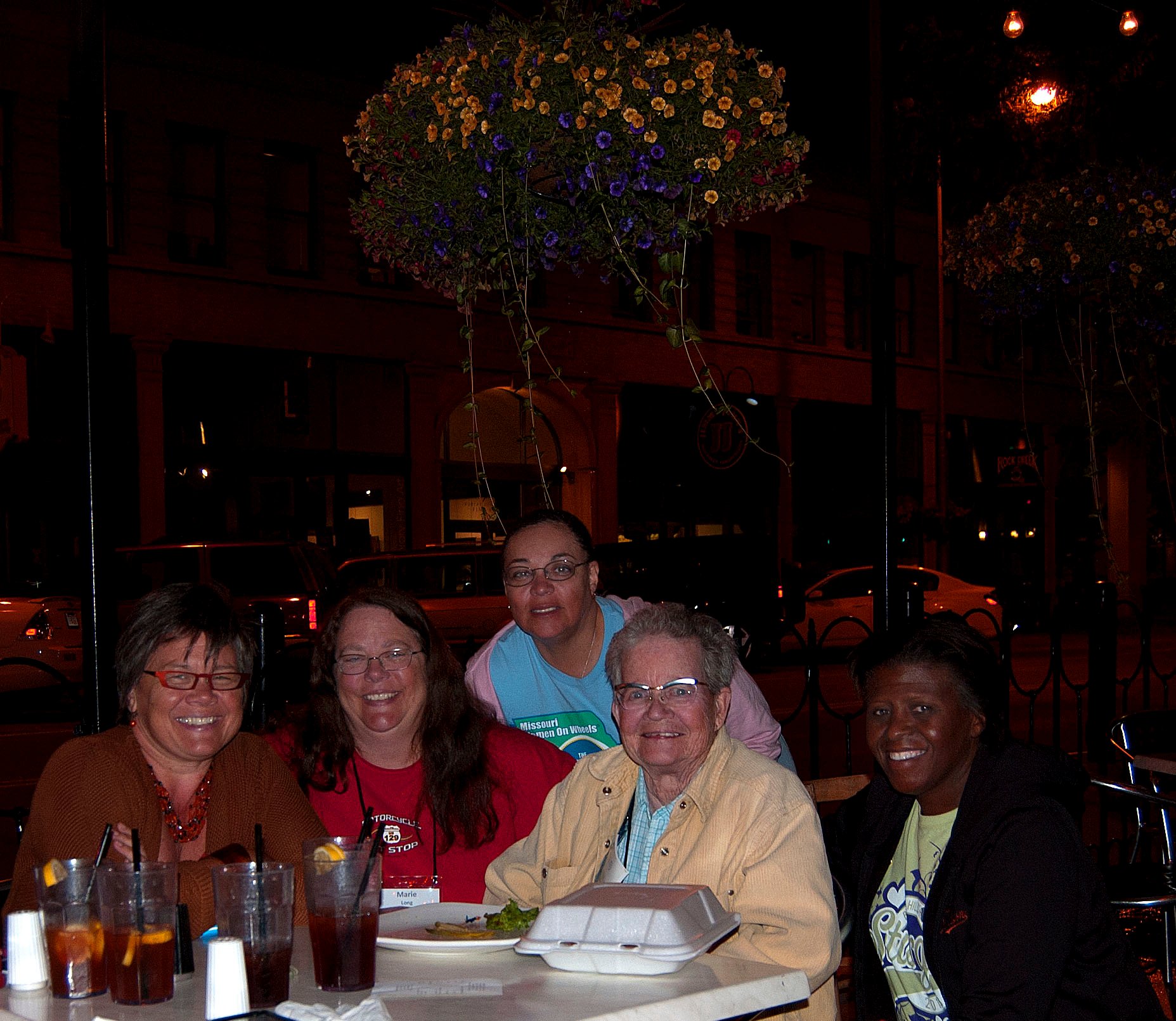 Group of women around a restaurant dinner table