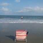 My chair in foreground, Matt in surf