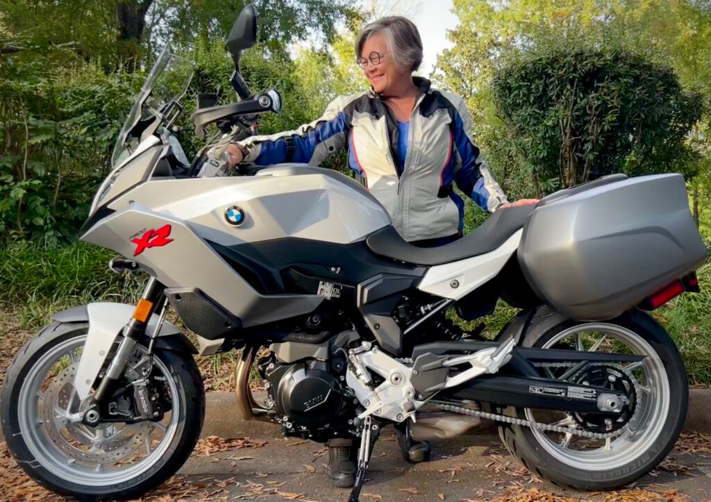 Tamela Rich looks at her BMW Motorcycle