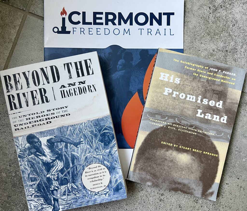 Two books about the Underground Railroad and a brochure about it from Clermont County, Ohio. Left is "Beyond the River: The Untold Story of the Heroes of the Underground Railroad." Center is the Clermont County brochure on Underground RR sites. Right is a slave narrative, "His Promised Land."