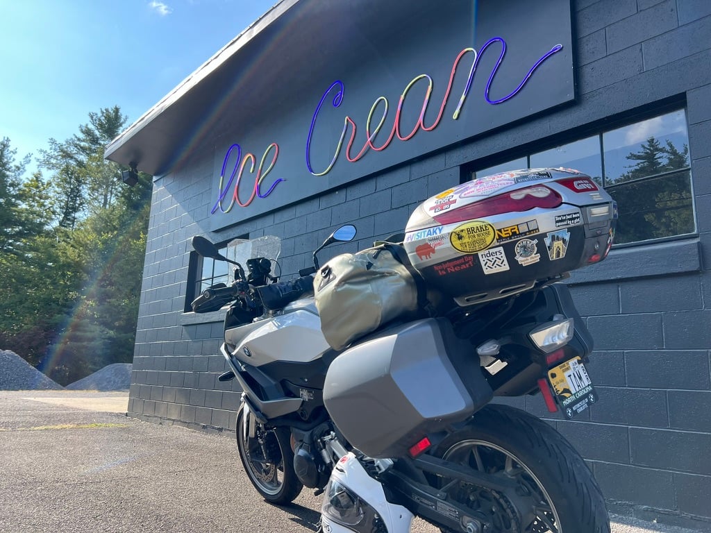 motorcycle in front of ice cream shop