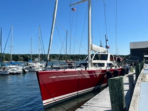 red yacht at dock